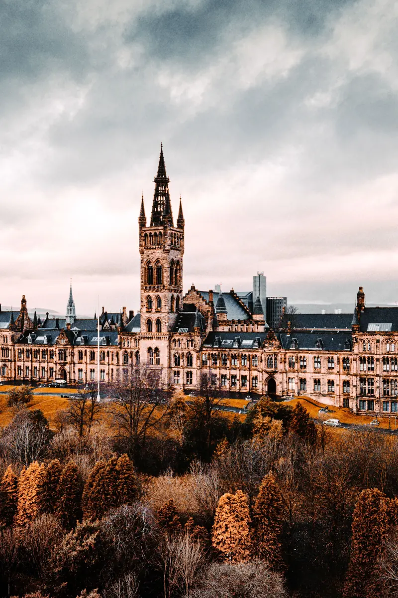 The University of Glasgow's main building and tower above Kelvingrove Park, the city where Delivix was founded