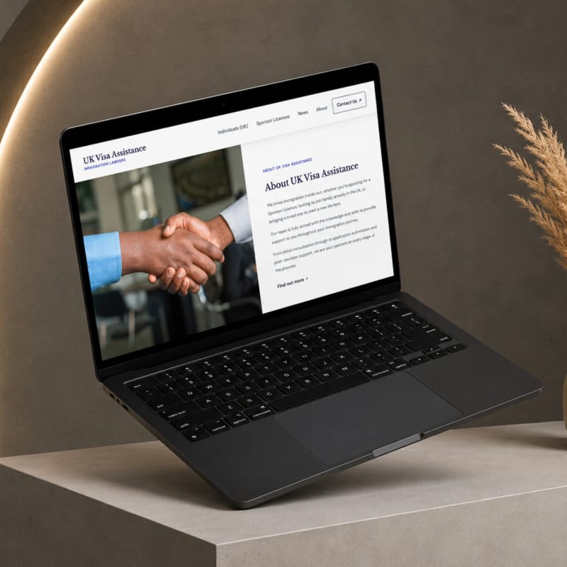 About UK Visa Assistance page on a laptop, introducing the firm's immigration team